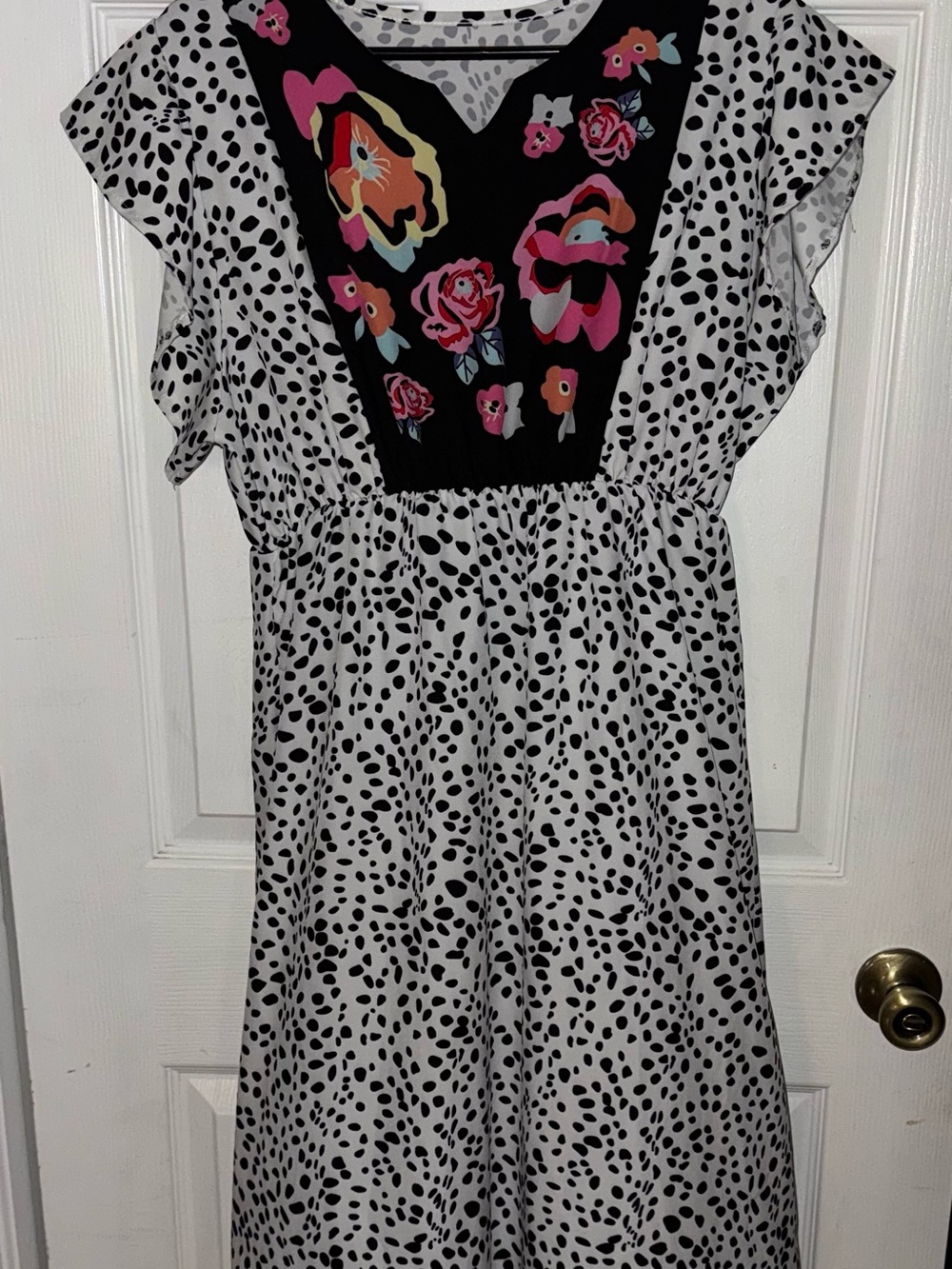 Women's Black & White Spotted Dress with Floral Bib